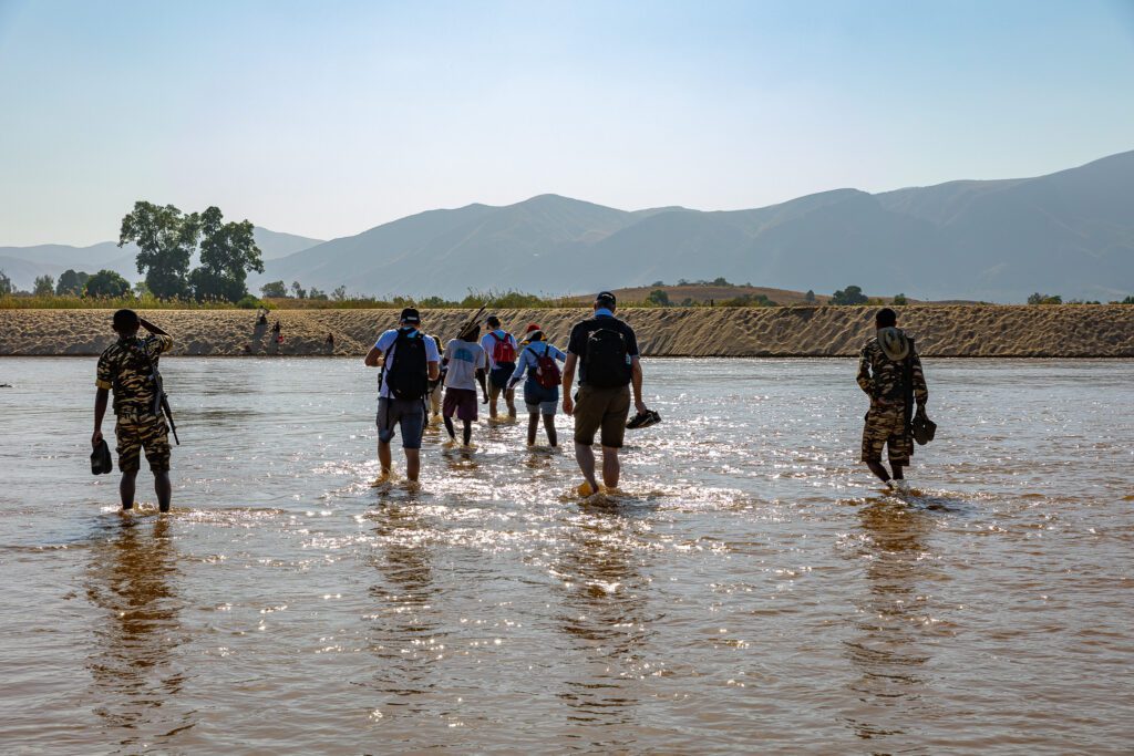 Despite the flight, doctors still wade through water to reach Ankavandra (credit: Svein-Robert Solberg)