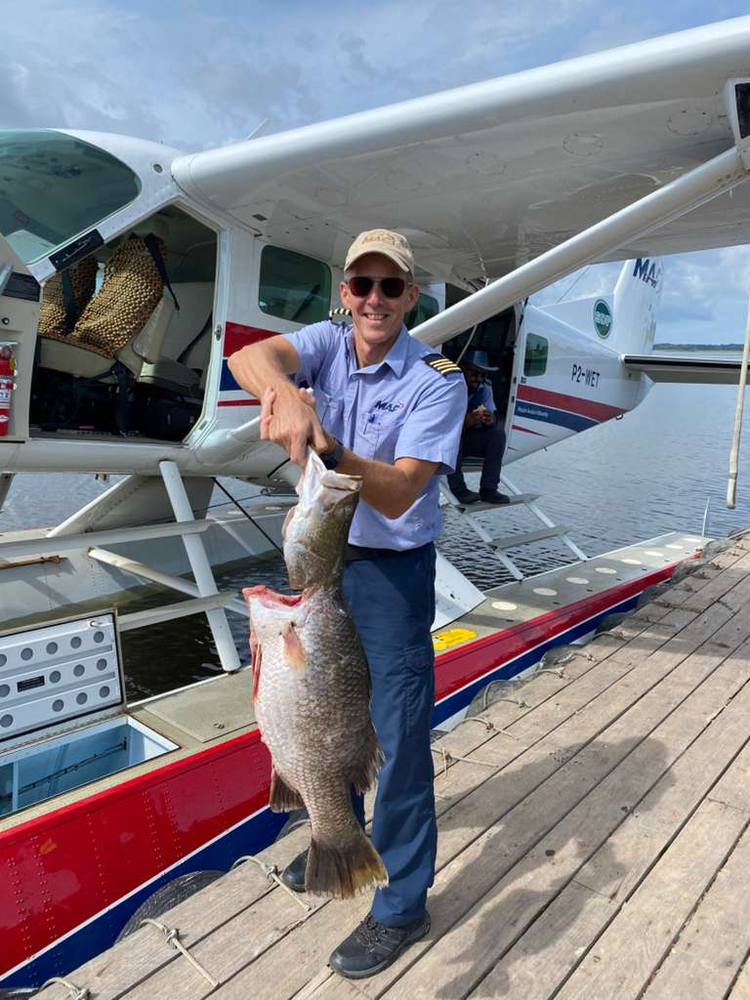 MAF floatplane pilot Chad Tilley regularly transports barramundi to Kiunga Town (credit: Chad Tilley)