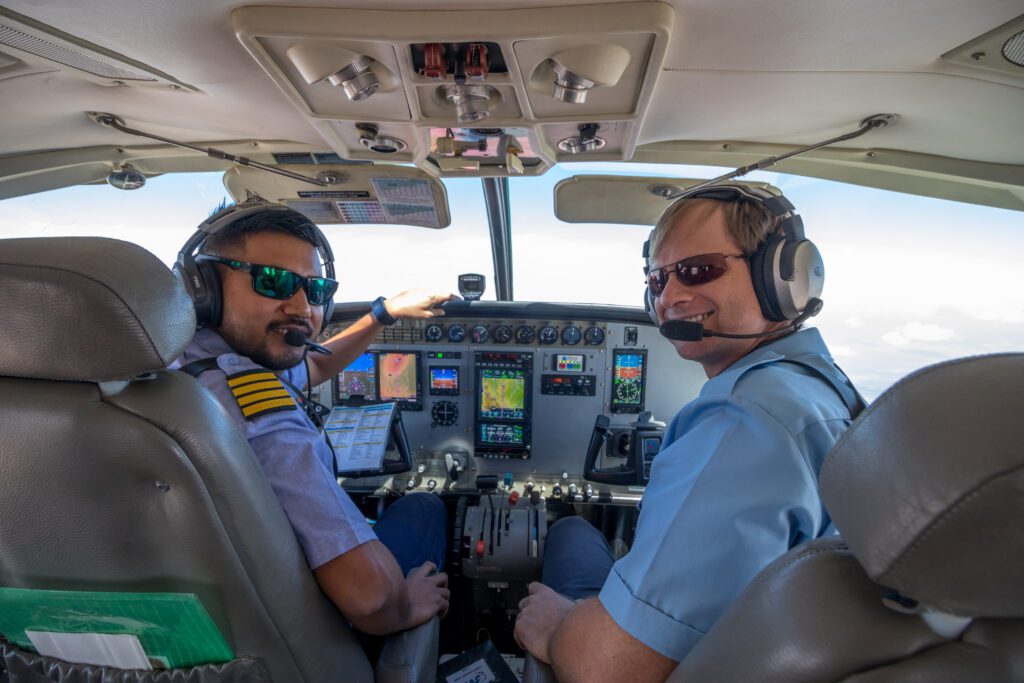 Daniel (R) with MAF colleague Ping Domtta (L) fly to Marsabit (credit: Mark & Kelly Hewes)