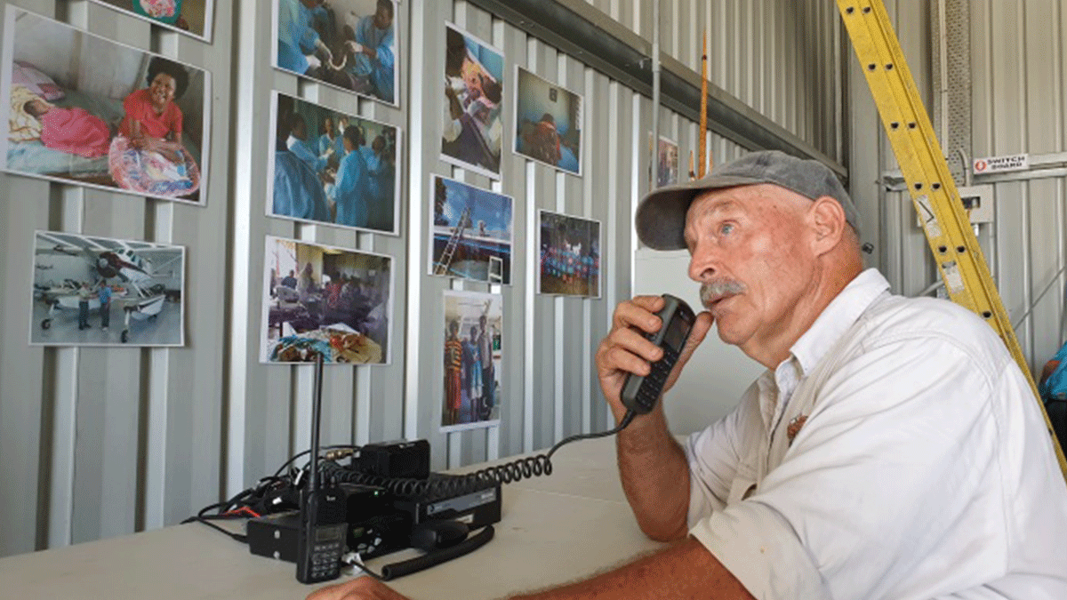 Dr Kirby using newly installed HF radio at THOR's headquarters (Credit: Gollinson Wena)