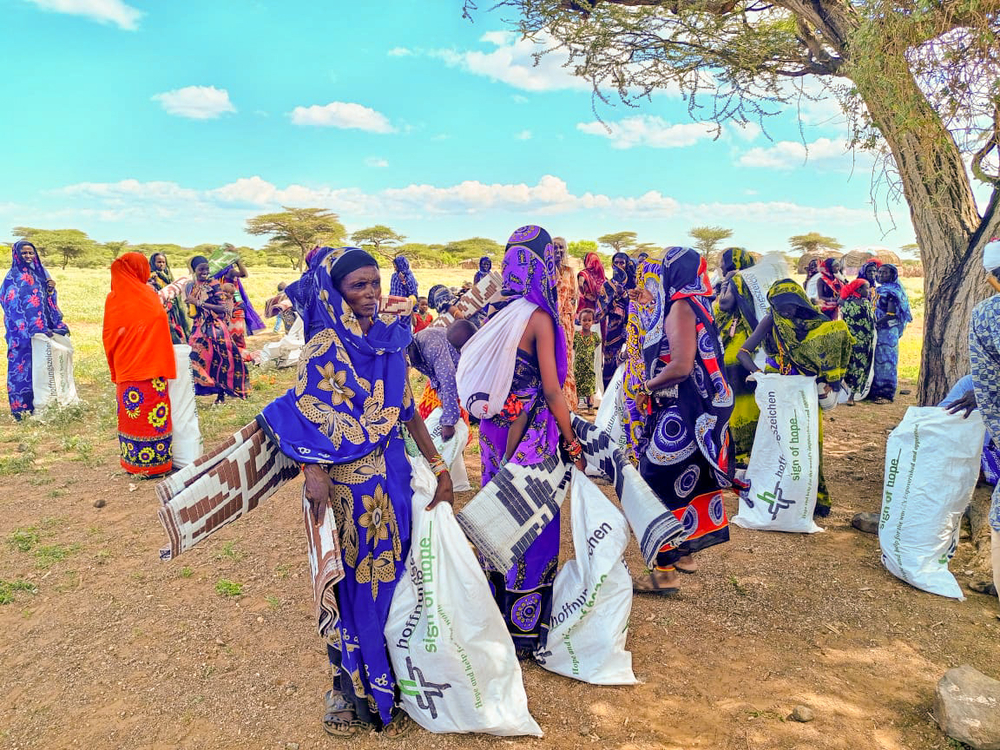 Before MAF’s delivery, these Barambate women were drinking dirty water (credit: Asher Abayo / Sign of Hope)