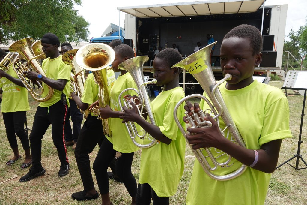 Young refugees at Bidibidi learn how to play brass instruments (credit: Damalie Hirwa)