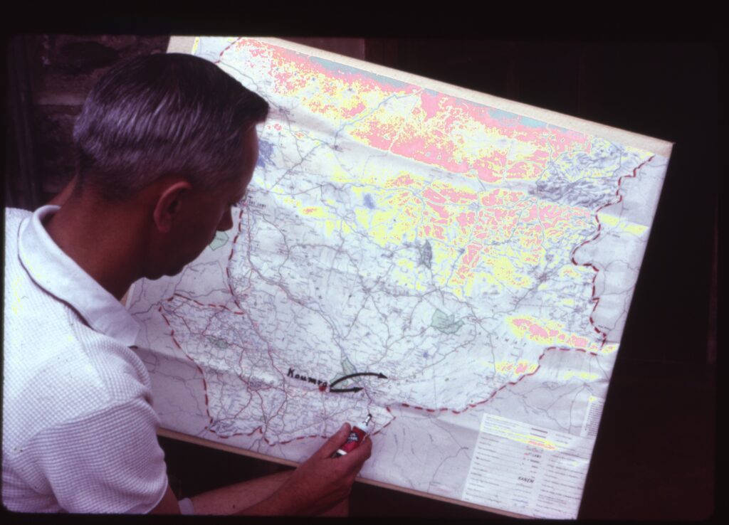 MAF co-founder, the late Stuart King, pours over a map of Chad (credit: Stuart King)