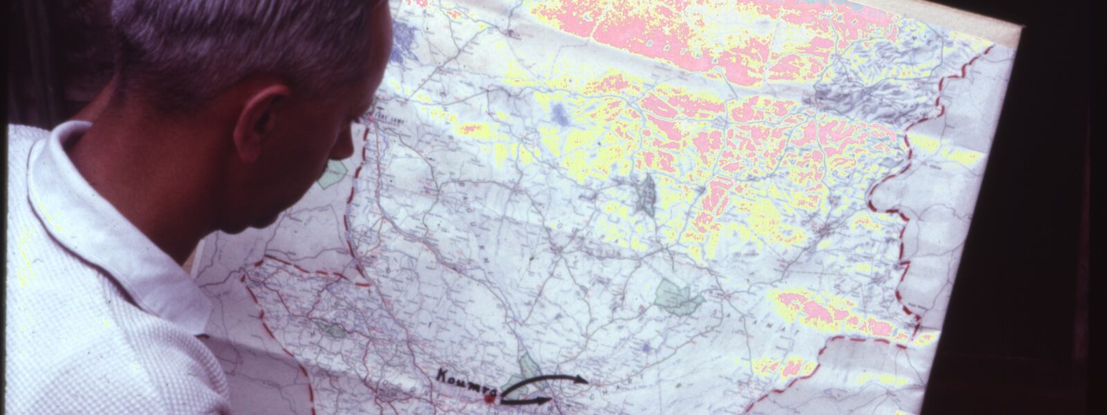 MAF co-founder, the late Stuart King, pours over a map of Chad (credit: Stuart King)