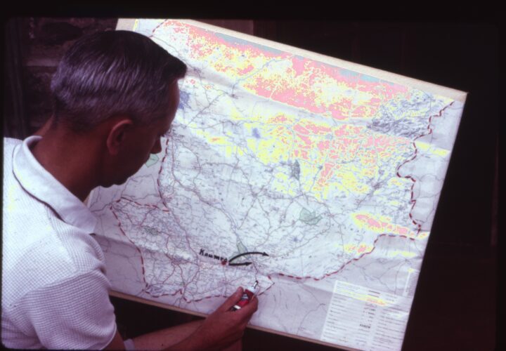 MAF co-founder, the late Stuart King, pours over a map of Chad (credit: Stuart King)