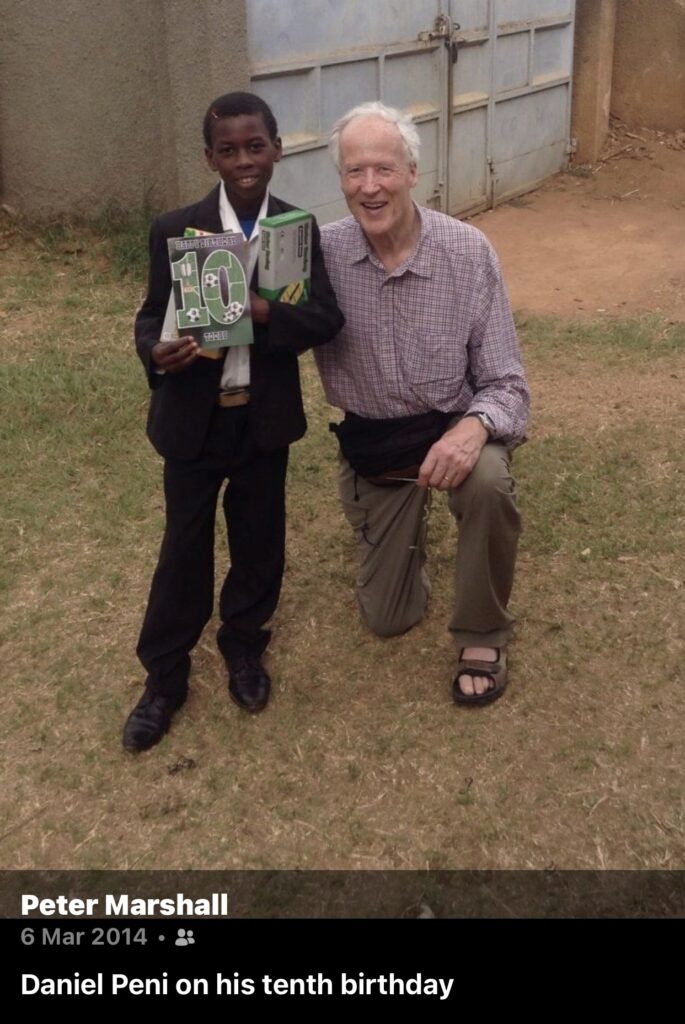 Peter with Daniel on his 10th birthday in Yambio in 2014 (credit: Peter Marshall)