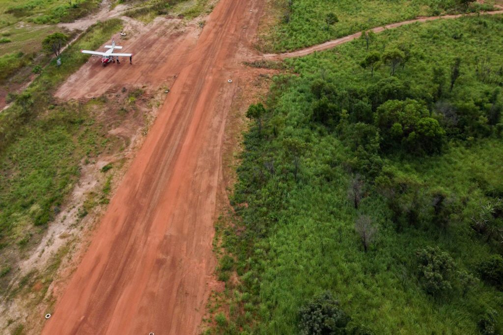 Michael fills in airstrip dents with an excavator (credit: Janne Rytkonen)