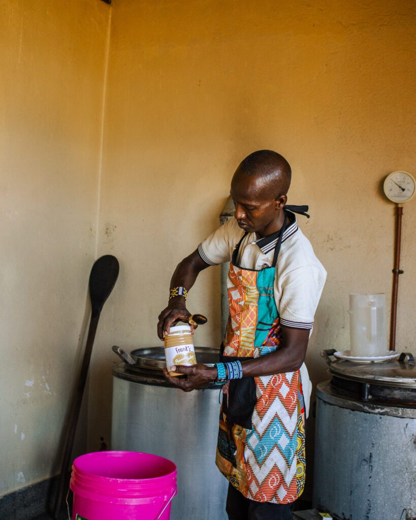 The school cook stirs peanut butter into meals which boosts calories (credit: HFTM)