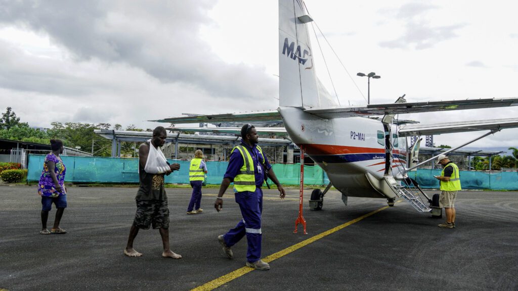 MAF medevacs a concussed man with an injured arm to Buka General Hospital (credit: Aquila Matit) 