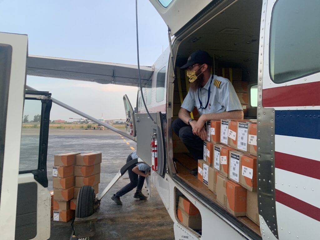 MAF flies dozens of boxes of hazmat suits to Bunia (credit: MAF US)