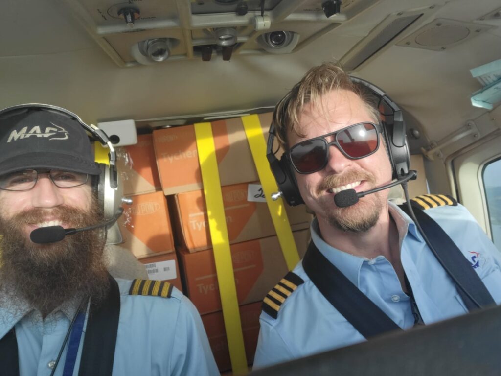 MAF Pilot Alfred Ottosson (R) says teamwork is integral to the mission’s success (credit: MAF US) 
